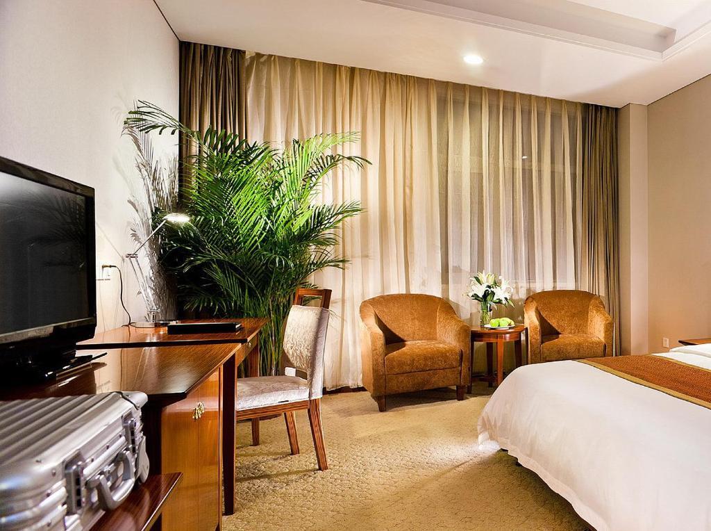 Nanjing Expo Center Hotel Rum bild
